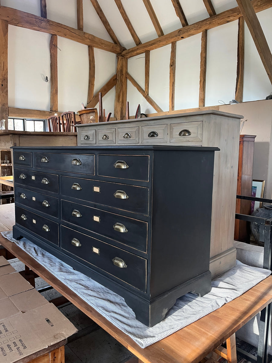 Curated vintage furniture in a warm interior setting